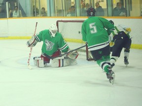 Chett Binning shoots the puck high to beat the Ripley Wolves goaltender in a shorthanded goal in the second period October 15 in Seaforth. (Shaun Gregory/Huron Expositor)