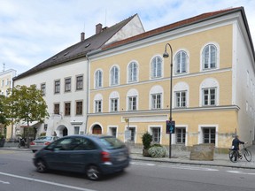 This Sept. 27, 2012 file picture shows an exterior view of Adolf Hitler's birth house, front, in Braunau am Inn, Austria. Austria's government said on Monday, Oct. 17, 2016 that it plans to tear down the house where Hitler was born and replace it with a new building. (AP Photo / Kerstin Joensson, File