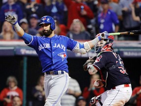 Toronto Blue Jays outfielder Jose Bautista strikes out against the Cleveland Indians during Game 2 of the American League Championship Series in Cleveland, Saturday, Oct. 15, 2016. (AP Photo/Gene J. Puskar)