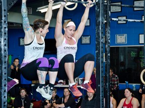 Forty people went head-to-head in a one-day challenge of CrossFit. With high-intensity workouts like knees-to-chest and kettlebell swings, these teams of two proved their strength and stamina. | Caitlin Clow photos/Pincher Creek Echo