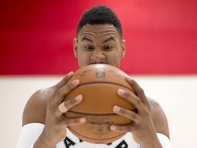 Toronto Raptors' Jared Sullinger poses with a ball for a photo shoot during a media day for the team in Toronto on Monday, September 26, 2016. (THE CANADIAN PRESS/Chris Young)