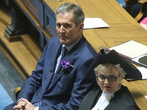 Manitoba Premier Brian Pallister (l) and house speaker Myrna Driedger.