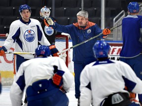 Oilers head coach Todd McLellan talks to players during Monday's practice at Rogers Place. (Ed Kaiser)