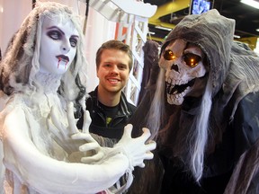 Tyler McDuffe displays some of the animatronic items for Hallowe'en at the Party Store in Winnipeg, Man. Monday October 17, 2016.
Brian Donogh/Winnipeg Sun/Postmedia Network