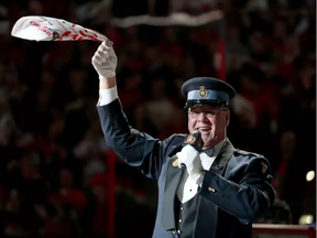 Lyndon Slewidge sings O Canada as the Ottawa Senators take on the Montreal Canadiens at Canadian Tire Centre on April 22, 2015 (Wayne Cuddington, Postmedia)