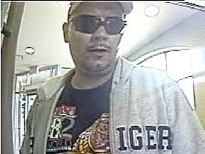 Kingston Police surveillance photos released on Monday October 17 2016 showing a suspect wanted in relation to the use of stolen cheques. Submitted Photo /The Whig-Standard/Postmedia Network
