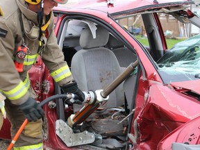 Patrick Filion  displayed the hard work that was necessary when trying to extricate someone from a vehicle accident.