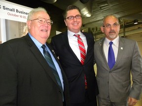 Ernst Kuglin/The Intelligencer
Quinte West Mayor Jim Harrison, Chris Palin of the Business Development Bank of Canada and Belleville Mayor Taso Christopher attend Tuesday’s breakfast meeting held at the National air Force Museum of Canada. The breakfast attracted more than 300 business leaders and municipal officials.