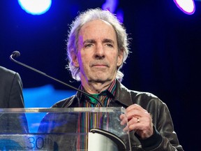 In this Jan. 24, 2015 file photo, Harry Shearer appears at the 30th annual TEC Awards during the 2015 National Association of Music Merchants (NAMM) show in Anaheim, Calif. Shearer filed a lawsuit in a federal court in Los Angeles on Monday, Oct. 17, 2016, against the French studio Vivendi S.A. over profits from the 1984 hit “This Is Spinal Tap” and its merchandise and music. (Photo by Paul A. Hebert/Invision/AP, File)