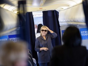 Democratic presidential nominee Hillary Clinton boards her plane at Westchester County Airport October 18, 2016 in White Plains, New York. (AFP PHOTO / Brendan Smialowski)
