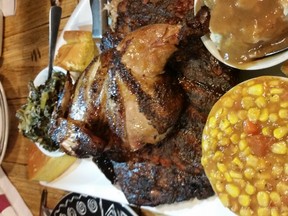 Sloppy Hoggs has bountiful platters of maple-smoked BBQ mixed meats. Graham Hicks