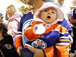 Edmonton Oilers fan Tia Matwiy, 6 months old, before a 2009 game against the Calgary Flames at Rexall Place in Edmonton. (Postmedia)