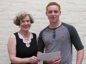 Jean Rossini presents the Carlo Rossini Memorial Diabetes Foundation Award to Justin Roets on Oct. 6. Named in honour of her late son, the award is presented to an outstanding student with Type I diabetes who is beginning post-secondary education. This year, the award was worth $2,000.