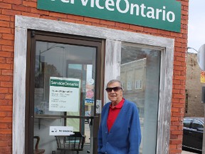 Bill Smith of Norwich stands outside the Service Ontario centre at 34 Main St., which he operated as a tobacco shop (also selling a variety of other items) for 68 years. (MEGAN STACEY/Sentinel-Review)