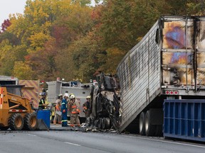 Fire destroyed a transport truck hauling food as it traveled west along Hwy 401 beteen Iona Road and Currie Road in Dutton. No one was injured in the incident. (DEREK RUTTAN, The London Free Press)