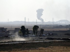 Smoke rises from a coalition airstrike on an ISIS position during the battle to retake Mosul, on October 18, 2016 near Mosul in Iraq. Joint forces from countries including Britain, U.S.A and France have joined Iraq and Iraqi Kurdistan to launch what is believed to be the largest ground operation since the invasion of Iraq in 2003 to retake Iraq's second largest city from the Islamic State who have held it since 2014. (Photo by Carl Court/Getty Images)