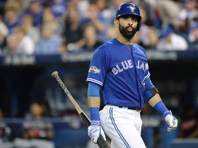 Jose Bautista strikes out during Game 4 of the American League Championship Series in Toronto against Cleveland on Oct. 18, 2016. (Craig Robertson/Toronto Sun/Postmedia Network)