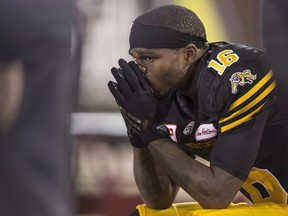 Hamilton Tiger Cats' Brandon Banks sits on the bench during the final minutes of their CFL game against the B.C. Lions in Hamilton on July 1, 2016. (THE CANADIAN PRESS/Geoff Robins)