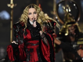 US singer Madonna performs on stage during her 'Rebel Heart' tour in Berlin, on November 10, 2015. Madonna stated during a brief standup comedy set that she would offer oral sex to anyone who votes for Hillary Clinton. (TOBIAS SCHWARZ/AFP/Getty Images)