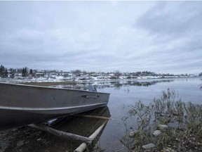 Boats are docked along the banks of the Churchill River in Stanley Mission, Sask. on Thursday, October 13, 2016. (Saskatoon StarPhoenix/Liam Richards)