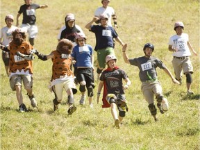 A file photos of Dairy Farmers of Canada First Annual Canadian Cheese Rolling Festival. Blackcomb Mountain, Whistler BC, Canada (Postmedia Network Files)