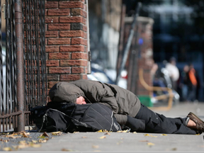 A man sleeps near the Salvation Army on George Street in Ottawa  (Tony Caldwell)
