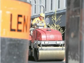 Jason Miller/The Intelligencer
Crews work on getting the paving of Front Street completed.