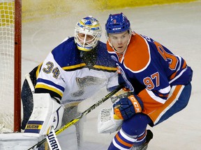 Connor McDavid skates past Blues goaltender Jake Allen during a game in March. (Larry Wong)