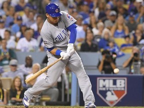 Cubs' Willson Contreras hits an RBI single during the fourth inning of Game 4 of the NL Championship Series against the Dodgers in Los Angeles on Wednesday, Oct. 19, 2016. (Mark J. Terrill/AP Photo)
