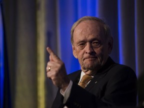 Former Prime Minister, Jean Chretien sits for a question and answer session during the University of St. Francis Xavier's annual national dinner and fundraiser in Toronto on Wednesday, October 19, 2016. THE CANADIAN PRESS/Christopher Katsarov