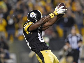 Pittsburgh Steelers wide receiver Antonio Brown celebrates after scoring a touchdown during the first half of an NFL football game against the Kansas City Chiefs in Pittsburgh, Sunday, Oct. 2, 2016. Brown was penalized for the celebration. (AP Photo/Don Wright)
