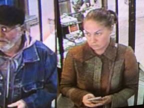 This handout photo from the Charlottetown Police Services shows the pair involved in an Oct. 12 robbery in Charlottetown. A Toronto-area couple has been arrested in a daring New Brunswick diamond theft that has been connected to a series of similar heists nationwide. THE CANADIAN PRESS/HO-Charlottetown Police Services