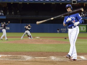 Toronto Blue Jays' Troy Tulowitzki throws his bat after making the final out in Game 5 of baseball's American League Championship Series against the Cleveland Indians in Toronto, Wednesday Oct. 19, 2016. (THE CANADIAN PRESS/Nathan Denette)