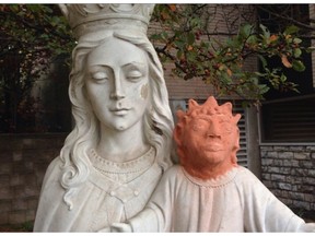 A statue is shown outside Ste. Anne des Pins parish in Sudbury, Ont., on Thursday Oct. 20, 2016. A statue of baby Jesus got a facelift after it was vandalized in northern Ontario - and the result is turning heads. THE CANADIAN PRESS/Gino Donato