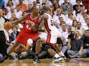 Elton Brand of the Philadelphia 76ers posts up against Joel Anthony of the Miami Heat during game five of the Eastern Conference Quarterfinals in the 2011 NBA Playoffs. (Mike Ehrmann/Getty Images)