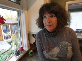 Christine Dobbs is pushing the province for a new anti-opiate strategy to improve access to services after losing her son, Adam Watson, to an overdose. Dobbs is photographed in her south Osborne home in Winnipeg on Thu., Oct. 20, 2016.