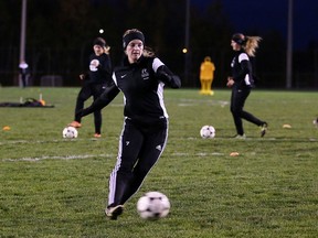 Members of the Cambrian Golden Shield women's soccer team run through some drills during team practice in Sudbury, Ont. on Thursday October 20, 2016. Gino Donato/Sudbury Star/Postmedia Network