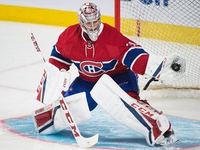 Canadiens goaltender Carey Price makes a save during the warm up prior to facing the Coyotes in Montreal on Thursday, Oct. 20, 2016. (Graham Hughes/The Canadian Press)