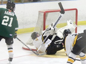 Making saves in Brandon's honour - Lucknow Sepoy's goalie Colton Metske makes a sprawling save with his stick during the team's 5-3 victory over Mount Forest. The game was one of many in honour of Colton's younger brother, who was the namesake for the Oct. 15, 2016 Brandon Metske Memorial Hockey Tournament in Lucknow.