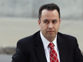 In this Nov. 19, 2015 file photo, former Subway pitchman Jared Fogle arrives at the federal courthouse in Indianapolis. The family of a girl who accused Fogle in a child pornography case that led to the former Subway pitchman's imprisonment is dropping a lawsuit against him. A motion filed Thursday, Oct. 20, 2016, in federal court in Indianapolis requested that the lawsuit be dismissed with prejudice, meaning it cannot be brought back to court. (AP Photo/Michael Conroy, File)