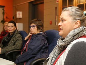 Jason Miller/The Intelligencer
The owner of The Cat's Meow, Sharon Huckle (first left), BJ Melnyk and Jeannette Davies, the owner of Quinte Midwives, address city staff during a meeting to garner feedback on a city proposal to change Victoria Avenue to a one-way street.