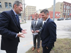 From the left; Manitoba Premier Brian Pallister, Brent Bellamy, board chair, CentreVenture, and Winnipeg Mayor Brian Bowman. The trio attended a media conference and talked about support for rental properties under development through the Live DowntownProgram. Friday, October 21, 2016.