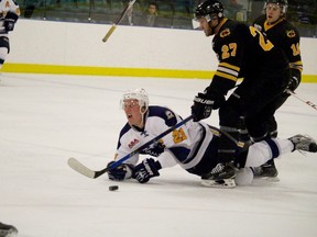 Stony Plain Eagles forward Tanner House gets down to block a shot during the team’s 5-2 opening victory on Oct. 15 over the Fort Saskatchewan Chiefs at the Glenn Hall Arena. The Eagles were within two wins of an Allan Cup berth last season, and added reinforcements in the off-season they believe can take them to the next level.  - Photo by Mitch Goldenberg