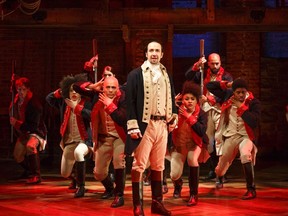 The Public Theater shows Lin-Manuel Miranda, foreground, with the cast during a performance of "Hamilton," in New York. (Joan Marcus/The Public Theater)