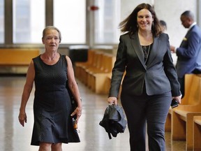Julie Patz, left, mother of Etan Patz, arrives at court in New York with Assistant District Attorney Joan Illuzzi-Orbon, to testify in the retrial of Pedro Hernandez, Friday, Oct. 21, 2016. After a jury deadlock last year, Hernandez is back on trial for kidnapping and killing 6-year-old Etan Patz in 1979. (AP Photo/Richard Drew)