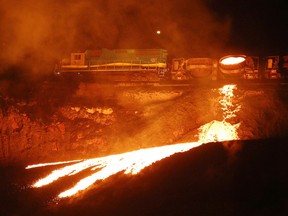 A Vale train dumps slag in Sudbury, Ont. on Wednesday October 12, 2016. Slag is a byproduct of the smelting process. Gino Donato/Sudbury Star/Postmedia Network