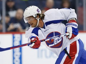 Teemu Selanne reconnects with his inner Jet. (CANADIAN PRESS)