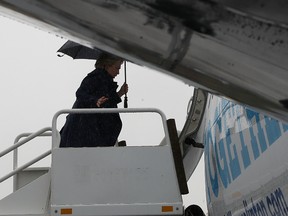 Democratic presidential nominee former Secretary of State Hillary Clinton boards her campaign plane at Westchester County Airport on October 21, 2016 in White Plains, New York. With just over two week before the election, Hillary Clinton is campaigning in Ohio. (Photo by Justin Sullivan/Getty Images)