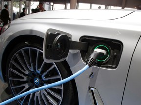 An electric BMW charging. (AP files)