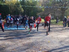 Runners take off at the start line of the 5K Cool Runnings trail race at Roth Park on Saturday, Oct. 22, 2016. (Sentinel-Review file photo)